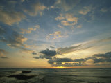 Clouds Silhouetted Against the Setting Sun over the Pacific Ocean Photographic Print by Steve Winter