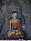 A Painted Stone Buddha Near Lhasa, Tibet Photographic Print by Gordon Wiltsie