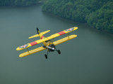 Vintage Stearman 43 Biplane Flies over the Elk River Photographic Print by Stephen Alvarez