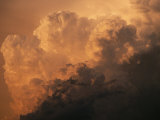 Storm Clouds Gather over the Badlands Photographic Print by Annie Griffiths Belt