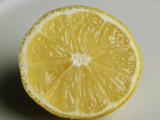Half of a Tart Lemon Photographic Print by Taylor S. Kennedy
