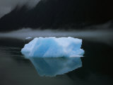 A Blue Iceberg and its Reflection in Calm Water Photographic Print by Ralph Lee Hopkins