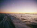 A View from a Speeding Boat as it Leaves a Wake at Twilight Photographic Print by Skip Brown