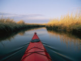 The Bow of a Kayak Leads the Way Through a Marsh Channel Photographic Print by Skip Brown