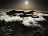 Softened by Haze, the Rising Sun Glows over Patchy Clouds Which Partially Obscure the Crater Photographic Print by William Allen