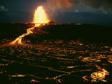 A Blazing Fountain and a River of Lava Pour from a Vent of the Volcano Photographie par Robert Madden