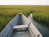The Bow of a Rowboat Slices Through the Marsh Grass Photographic Print by Skip Brown