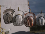 Cowboy Hats Hang on a Clothesline at a Festival in Santa Fe Photographic Print by Jodi Cobb