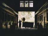 Cleaning Horse Stalls in Kentucky Photographic Print by Dick Durrance
