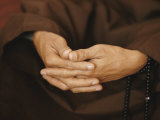 Close View of a Monks Hands Crossed in Prayer Photographic Print by W. E. Garrett