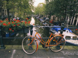 The Keizersgracht Canal, with Potted Flowers and a Bicycle in the Foreground Photographic Print by Richard Nowitz