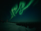 The Aurora Borealis Creates Fantastic Patterns Across the Evening Sky Photographic Print by Norbert Rosing