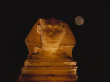 A View of the Great Sphinx at Night, Lit by a Light Show and Backed by a Full Moon Photographie par Bill Ellzey