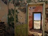 A Doorway Leads to Another Doorway in the Interior of an Abandoned Building Photographie