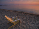 Beach Chair Facing the Water at Twilight Photographic Print by Bill Hatcher