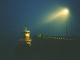 A Tugboat by the Dock Photographic Print by Bill Curtsinger