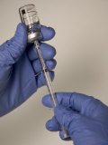 Medicine is Drawn into a Syringe Photographic Print by Taylor S. Kennedy