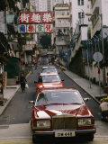 One of Hong Kongs Many Rolls Royce Cars in Central Photographic Print by Eightfish 