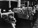 Commuters Reading of John F. Kennedy's Assassination Photographic Print by Carl Mydans