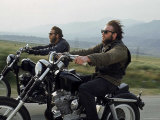 Hell's Angels Riding Motorcycles on Road Lámina fotográfica por Bill Ray