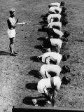 Athletes in Starting Position For a Race Premium Photographic Print