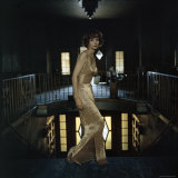 Model Wearing Gold Beaded Sheath Gown by Designer Helen Rose Photographie par Gordon Parks