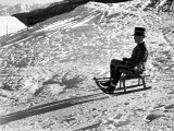 Italian Officer Enjoying a Sled Ride in the Italian Alps Photographie par Alfred Eisenstaedt