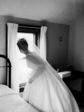Bride Prepares For Wedding, in Traditional White Gown, 19th Century Wedding Dress Premium Photographic Print by Michael Rougier