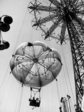 Couple Taking a Ride on the 300 Ft. Parachute Jump at Coney Island Amusement Park Photographic Print by Marie Hansen