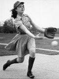 Pro Baseball Pitcher For Rockford Peaches, Caroline Morris, Demonstrating Her Underhanded Delivery Premium Photographic Print by Wallace Kirkland