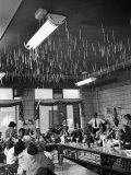 Soda Fountain Proprietor Watching as Kids Use Drinking Straw Covers as Straw Blowgun Missiles Premium Photographic Print by Wallace Kirkland