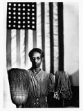 Ella Watson Standing with Broom and Mop in Front of American Flag, Part of Depression Era Survey Photographic Print by Gordon Parks