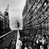 Shipyard Workers Watching as the "Bethlehem Fairchild" Launches Into the Water Photographic Print by Marie Hansen