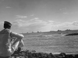 US Sailor Watching Navy Vessels on the Horizon Photographic Print by Carl Mydans