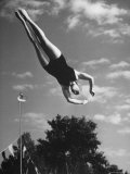 Diver Barbara Ramser Performing Dive Premium Photographic Print by Gordon Coster