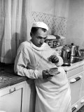 Dr. Ernest Ceriani in a State of Exhaustion, Having a Cup of Coffee in the Hospital Kitchen at 2 AM Photographie par W. Eugene Smith