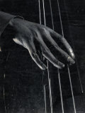Hand of Bass Player on the Strings During Jam Session at Photographer Gjon Mili's Studio Premium-Fotodruck von Gjon Mili