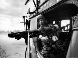 Helicopter Crew Chief James Farley Using M-60 Machine Gun in Landing Zone Near Da Nang Premium Photographic Print by Larry Burrows