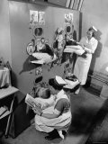 Nurses at Children's Hospital Tending Young Polio Patients Contained in Iron Lung Room Photographic Print by Hansel Mieth