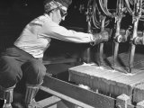 Female Steel Worker Operating Four Torch Machine to Cut Large Slab of Steel at Mill Fotografie-Druck von Margaret Bourke-White