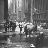 Pedestrians Crossing Slushy Intersection at Wall Street Photographic Print by Walker Evans