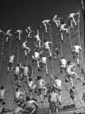 Cadets in the US Navy Climbing Rope Wall During Obstacle Course Premium Photographic Print by Dmitri Kessel