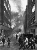 London Auxiliary Fire Service Working on a Fire Near Whitehall Caused by Incendiary Bomb Premium Photographic Print by William Vandivert