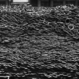 Pile of New and Used Tires over 40 Feet Deep at the B.F. Goodrich Yard Photographic Print by William C. Shrout