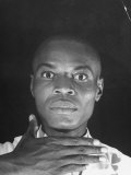 Haitian Voodoo Priest Louis Romain Making the First Gesture in the Greeting Ritual Premium Photographic Print by Rex Hardy Jr.
