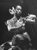 Balinese Dancer Dvi Dja at the Sarong Room, Using Hands to Signify Part of Story Premium Photographic Print by Marie Hansen