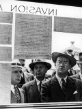 Businessmen Stopping to Read Notice Proclaiming the D Day Allied Invasion of France Premium Photographic Print by Gordon Coster
