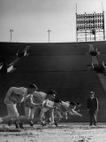 Coach Jess Hill, Leading the Track Team's Practice Premium Photographic Print by John Florea