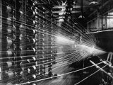 Cotton Being Prepared For Weaving at Cotton Mill Premium Photographic Print by Nat Farbman