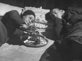 Customers at an Opium Den Preparing the Drug For Use Premium Photographic Print by George Lacks